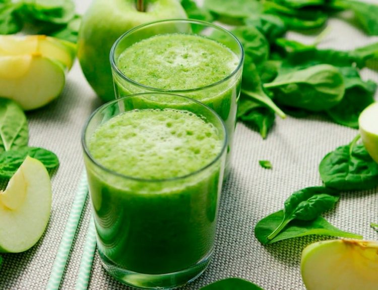 green liquid in clear drinking glass